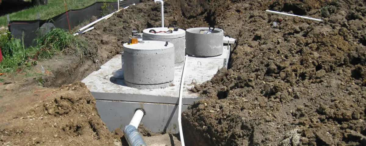 Septic system repair and installation site with tank access ports in Mesa, AZ